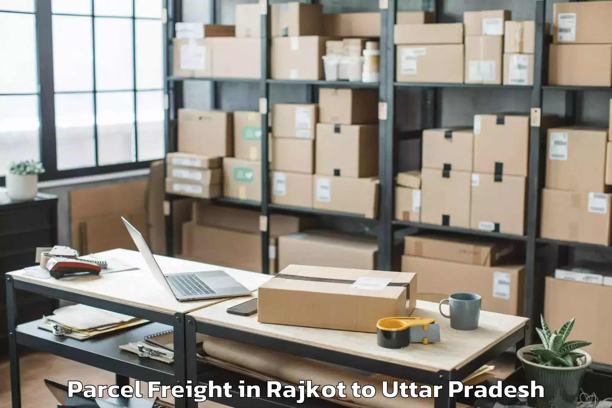 Reliable Rajkot to Madhoganj Parcel Freight